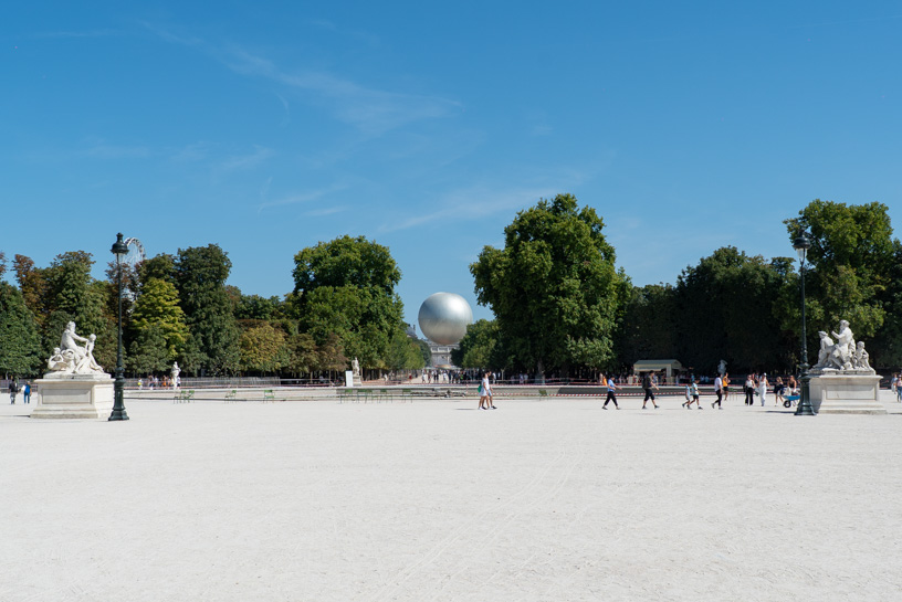 Flamme olympique Tuileries Paris — cours photo réglage ISO ouverture vitesse débutant